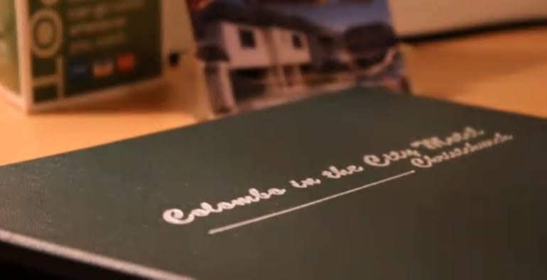 Colombo In The City Christchurch Exterior photo A book with a dedication
