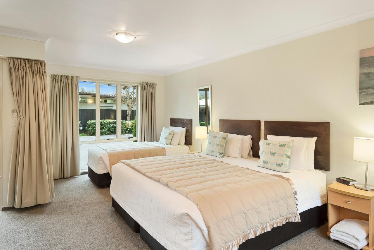 Colombo In The City Christchurch Exterior photo A typical bedroom at the hotel